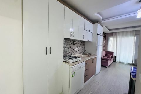 ÇİFTLİKKÖY'DE SİTE İÇİ YÜKSEK KAT GENİŞ BALKONLU EŞYALI 1+1