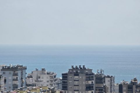 KARİZMA'DAN DENİZ GÖREN HAVUZLU JENERATÖRLÜ SIFIR 3+1 DAİRE