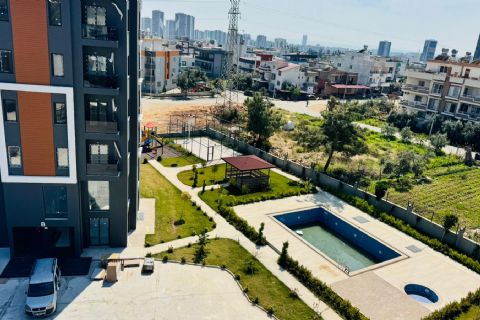KARİZMA'DAN SİTE İÇERİSİNDE YERDEN ISITMALI HAVUZLU 2+1