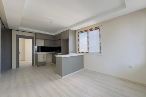 KARİZMA'DAN TÖMÜK'TE HAVUZLU SİTE GENİŞ 1+1 DAİRE