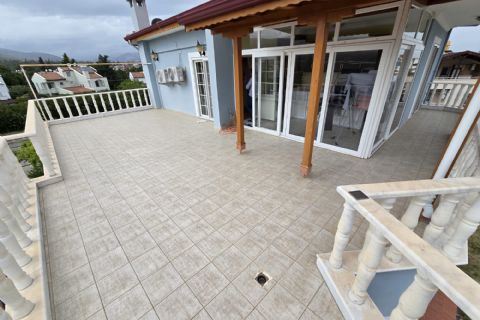 Kuyuluk'ta 2.500m² İmarlı Arsa İçinde Lüks Tripleks Villa