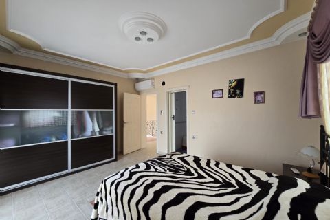 Kuyuluk'ta 2.500m² İmarlı Arsa İçinde Lüks Tripleks Villa