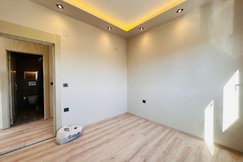 MEZİTLİ KUYULUK'TA 3 CEPHELİ DOĞALGAZLI MODERN 2+1