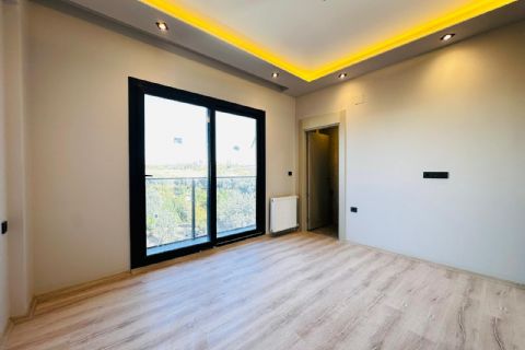 MEZİTLİ KUYULUK'TA 3 CEPHELİ DOĞALGAZLI MODERN 2+1