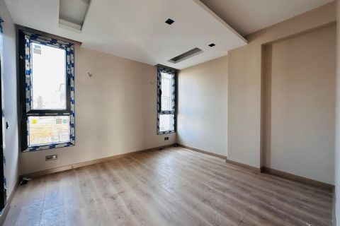 YENİŞEHİR'DE 50.YIL TEK BLOK YATAY MİMARİ MODERN  2+1