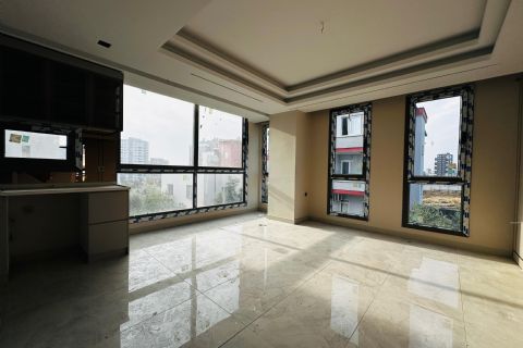 YENİŞEHİR'DE 50.YIL TEK BLOK YATAY MİMARİ MODERN  2+1